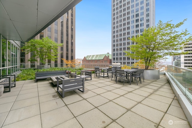 view of patio with a balcony