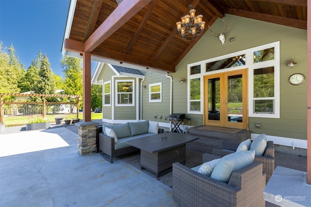 view of patio with an outdoor living space, a grill, and french doors