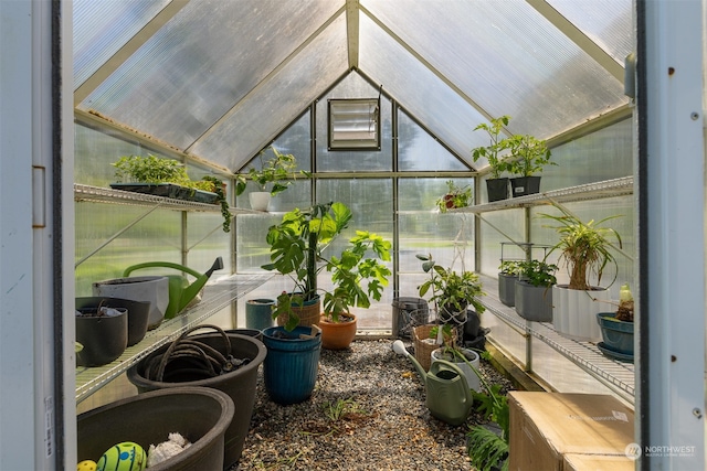 sunroom / solarium with vaulted ceiling