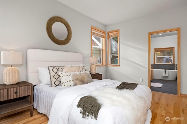 bedroom with light hardwood / wood-style floors