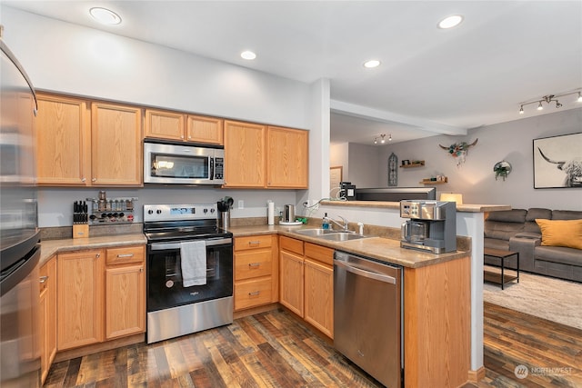 kitchen featuring sink, kitchen peninsula, stainless steel appliances, beam ceiling, and dark hardwood / wood-style floors