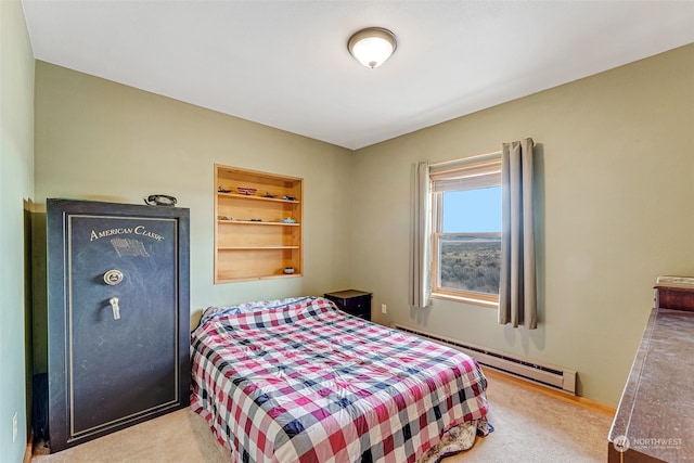 bedroom featuring baseboard heating and light colored carpet