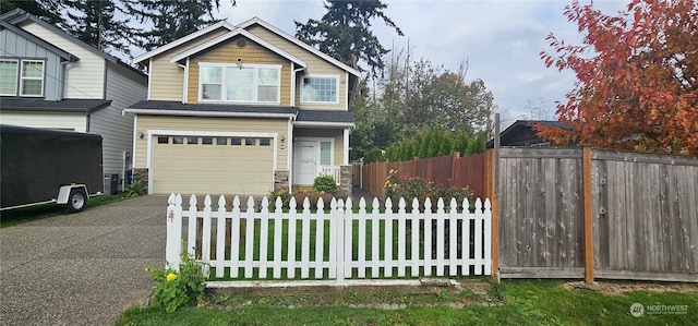 view of front of property with a garage