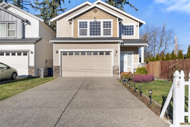 view of front facade featuring a garage and a front lawn