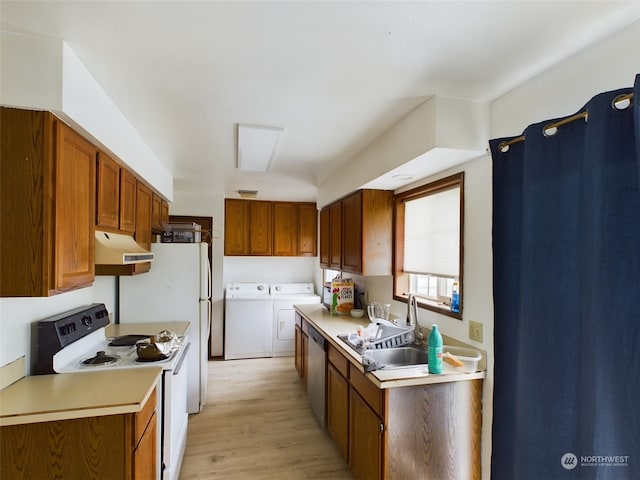 kitchen with sink, separate washer and dryer, white range with electric cooktop, light hardwood / wood-style floors, and stainless steel dishwasher