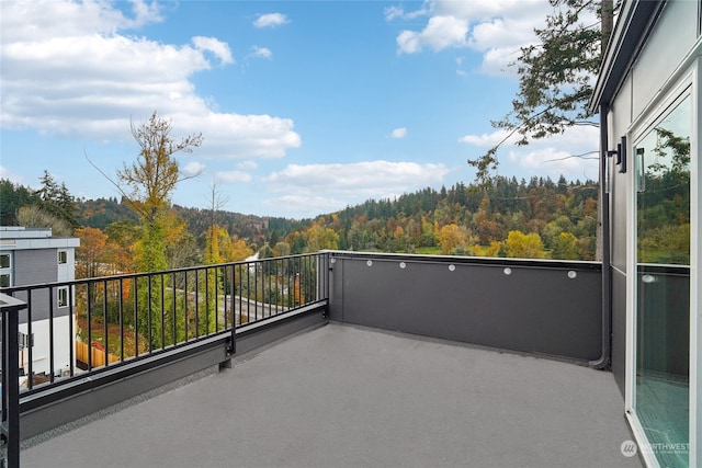 balcony with a wooded view