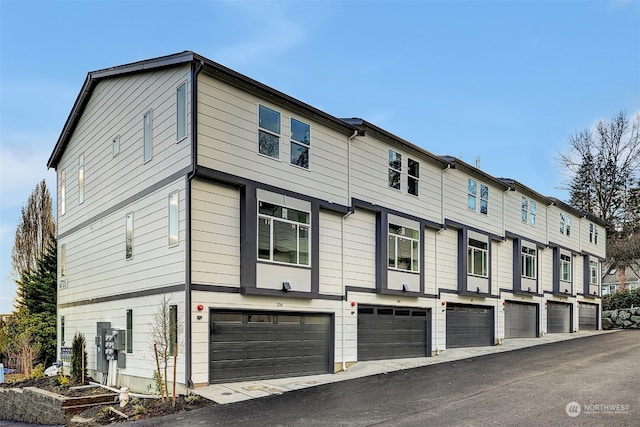 exterior space with a garage