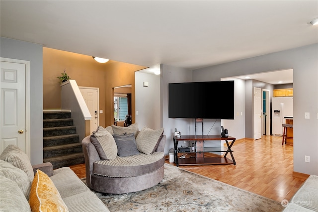 living room with light hardwood / wood-style floors