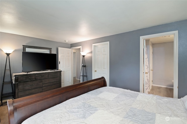 bedroom featuring light wood-type flooring