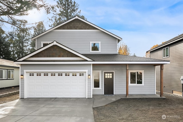 view of front of property with a garage