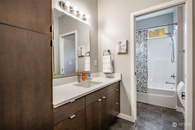 bathroom with vanity, tile patterned floors, and shower / bath combo with shower curtain