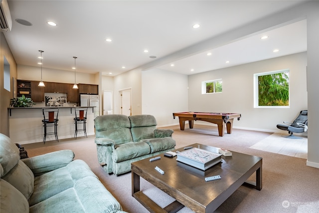 carpeted living room featuring a wall mounted AC and billiards