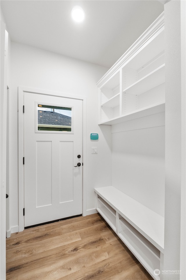 mudroom with light hardwood / wood-style flooring