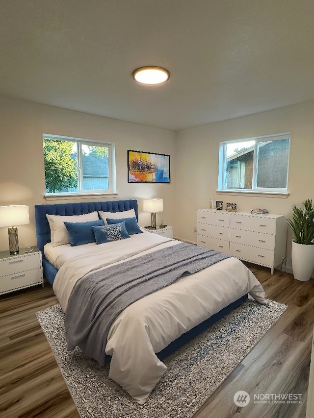 bedroom featuring dark wood-type flooring