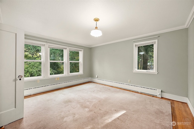 unfurnished room with wood-type flooring, a baseboard radiator, and ornamental molding