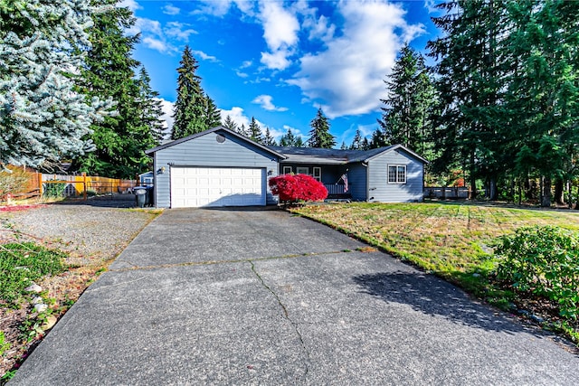 single story home with a garage and a front yard