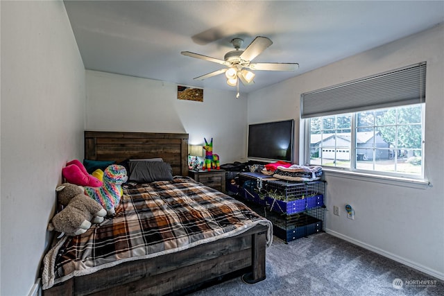 604 Nieland Loop SE, Rainier, WA 98576 - bedroom with carpet, a ceiling fan, and baseboards
