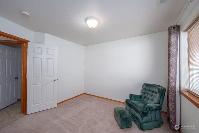 1300 W Marina Dr Unit 34, Moses Lake, WA 98837 - unfurnished room with baseboards and light carpet
