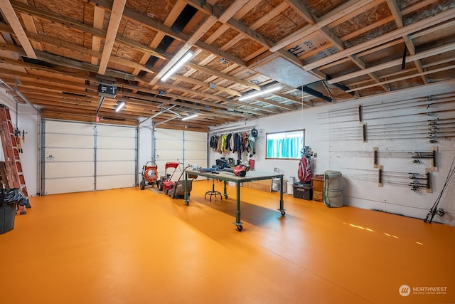 garage with a workshop area