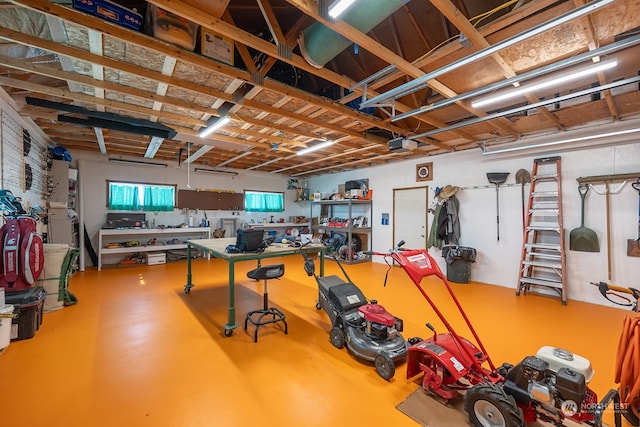 basement with a workshop area