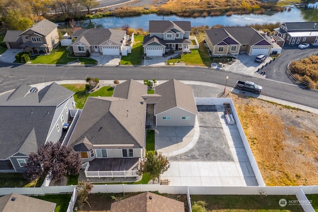 bird's eye view with a water view