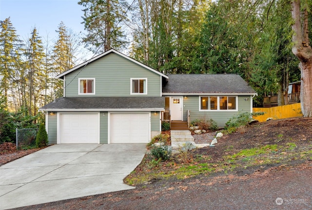 split level home with a garage