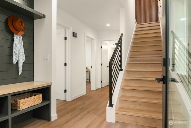 stairway with wood-type flooring