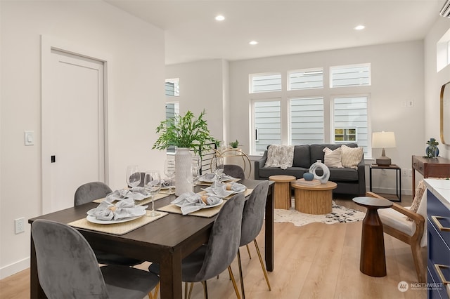 dining room with light hardwood / wood-style floors