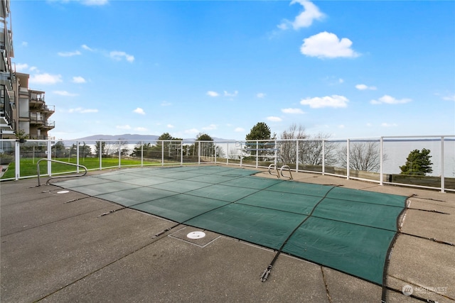 view of pool featuring a mountain view