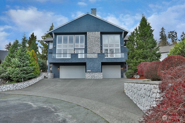 view of front of property with a garage