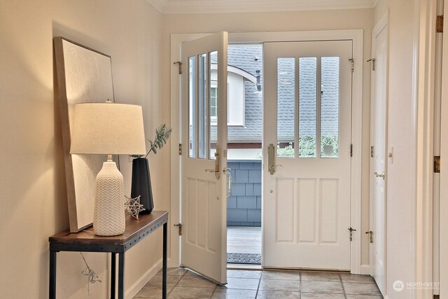 4962 Lilac Dr, Freeland, WA 98249 - foyer featuring crown molding and light tile patterned flooring