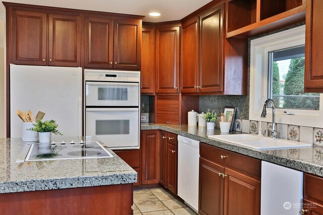 4962 Lilac Dr, Freeland, WA 98249 - kitchen with white appliances, a sink, tasteful backsplash, and recessed lighting