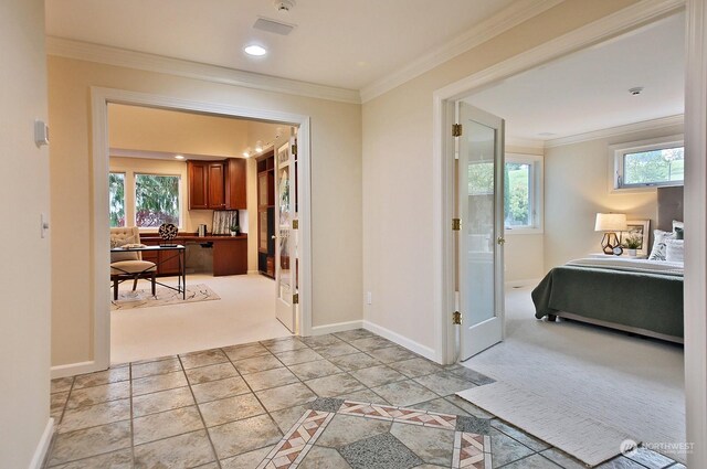 4962 Lilac Dr, Freeland, WA 98249 - hallway with crown molding, light carpet, and baseboards