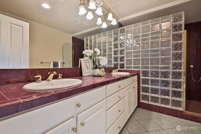 4962 Lilac Dr, Freeland, WA 98249 - bathroom featuring walk in shower, double vanity, tile patterned flooring, ornamental molding, and a chandelier