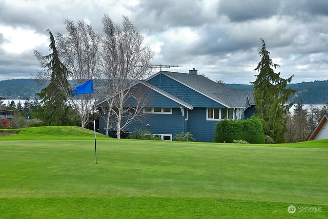 4962 Lilac Dr, Freeland, WA 98249 - view of property exterior with a yard