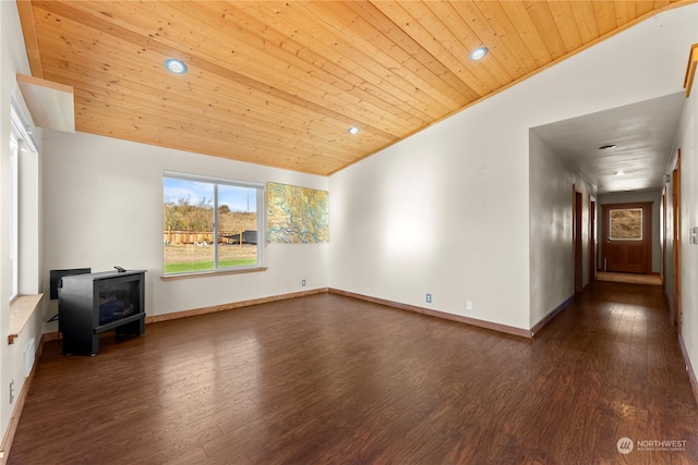 unfurnished living room featuring lofted ceiling, dark hardwood / wood-style floors, and wooden ceiling