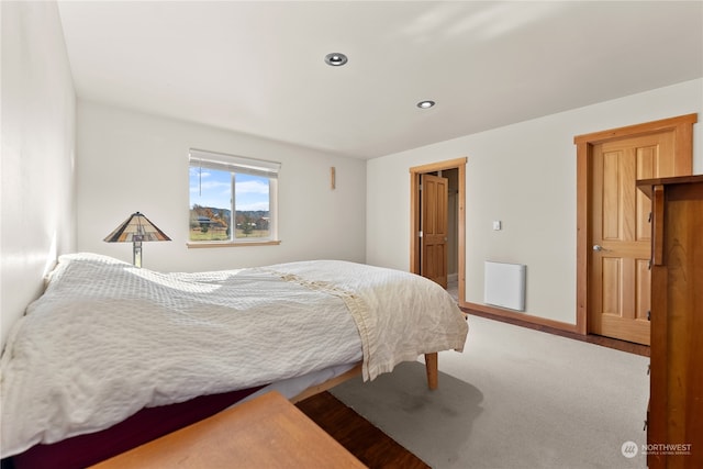 bedroom featuring wood-type flooring