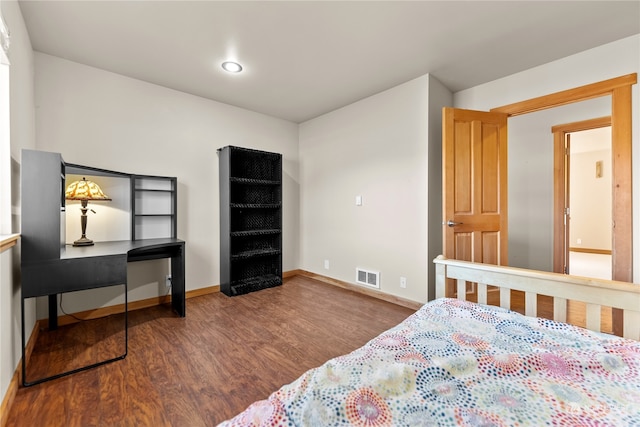 bedroom featuring wood-type flooring