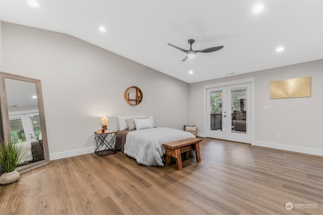 bedroom featuring access to outside, french doors, ceiling fan, and light wood-type flooring