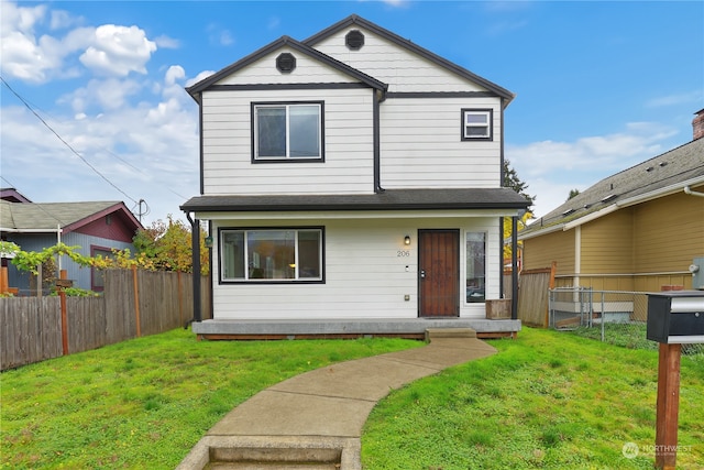 front facade with a front lawn