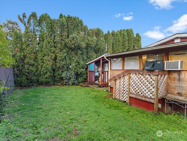 view of yard with a wooden deck