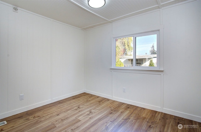 unfurnished room featuring light hardwood / wood-style flooring