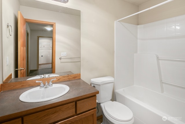 full bathroom with vanity, toilet, and tub / shower combination