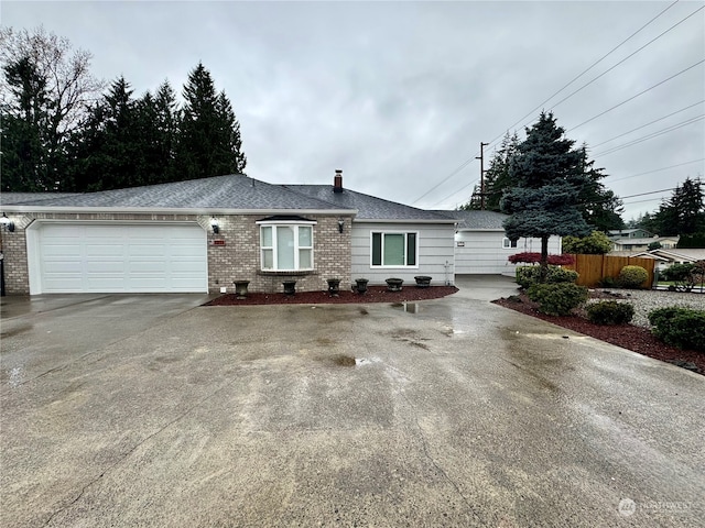 single story home with a garage