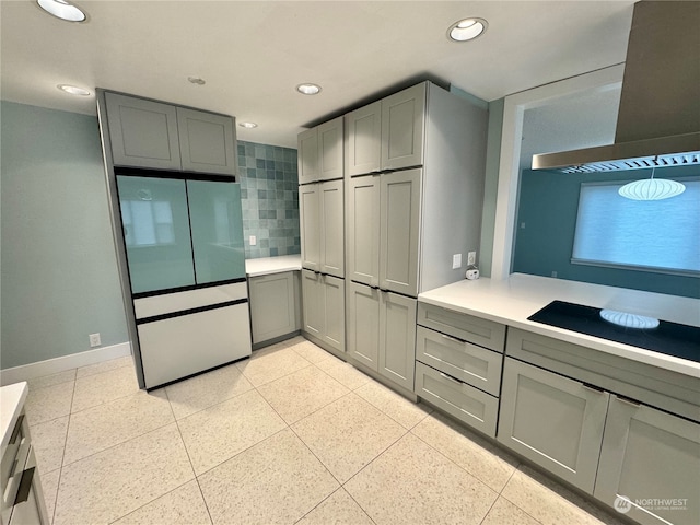 kitchen with refrigerator and gray cabinets