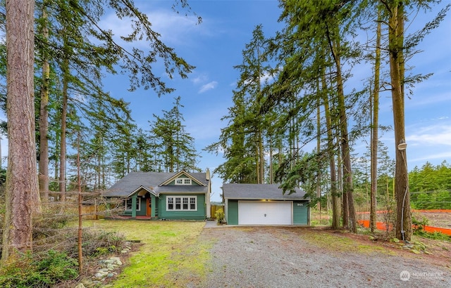 view of front of home featuring an outbuilding and a garage