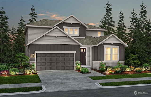 craftsman-style home with roof with shingles, board and batten siding, and concrete driveway