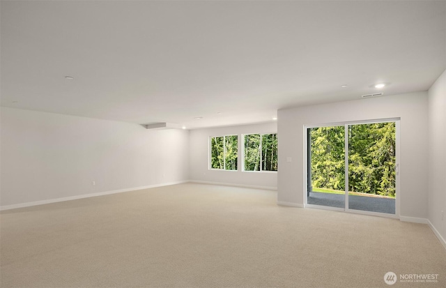 23557 Arbors Terrace Rd NE Unit 32, Kingston, WA 98346 - spare room with baseboards, light carpet, and recessed lighting