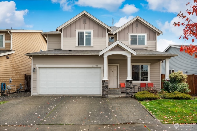 craftsman house featuring a garage