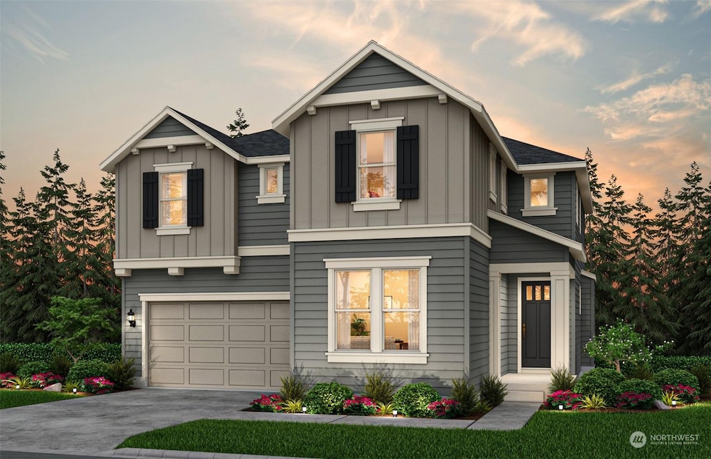 23534 Arbors Terrace Rd NE Unit 43, Kingston, WA 98346 - view of front facade featuring board and batten siding, driveway, and a garage